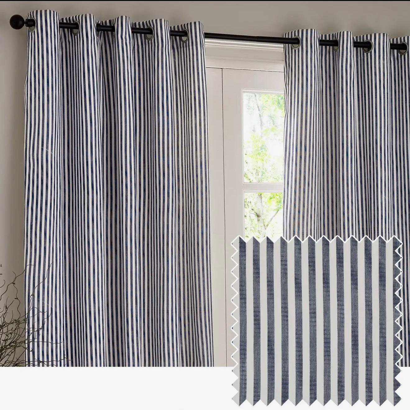 Navy blue and black striped blackout eyelet curtains from Riva Home, soft furnishings for window privacy and light control.