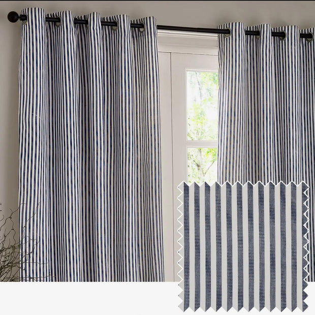 Navy blue and black striped blackout eyelet curtains from Riva Home, soft furnishings for window privacy and light control.