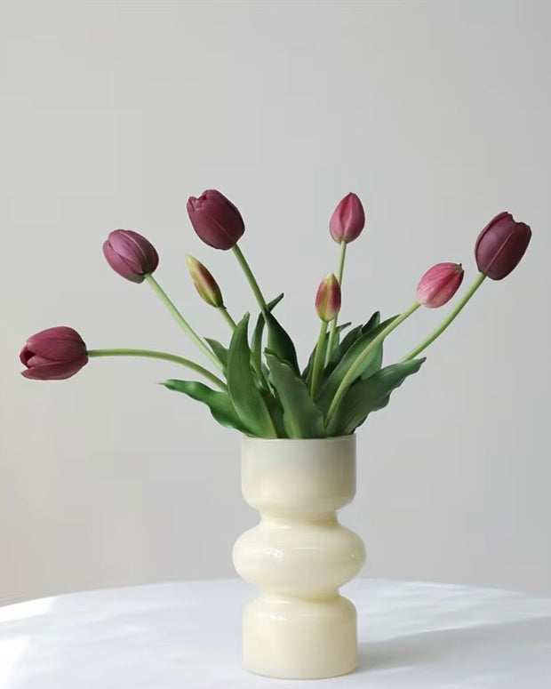Burgundy tulip stems in a bunch of 5 artificial spring flowers, crafted by Starlight Express, shown in a natural arrangement.