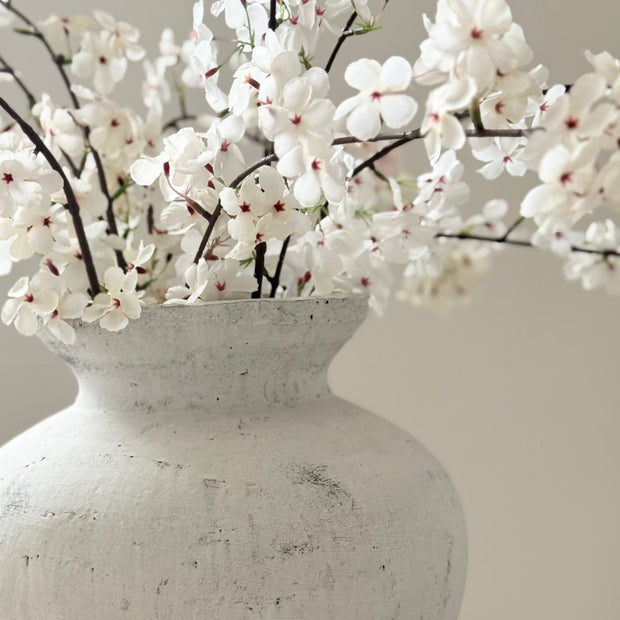 Artificial tall white cherry blossom stem from Starlight Express, featuring delicate white blossoms on a natural-looking stem.