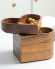 Small dark wood heart-shaped dish from Starlight Express, ideal for kitchen and dining decor or serving small items.