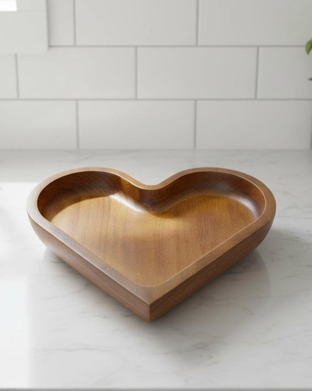 Small dark wood heart dish from Starlight Express, a charming kitchen and dining accessory for holding small items or decor.