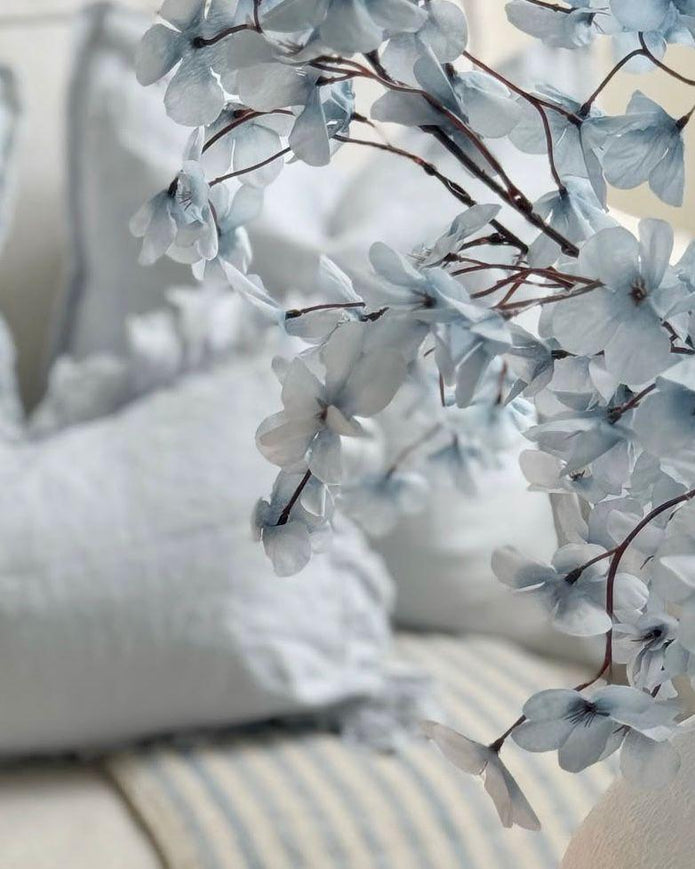 Artificial Ocean Blue Blossom Stem from Starlight Express, showcasing vibrant blue flower blossoms on a realistic plant stem.