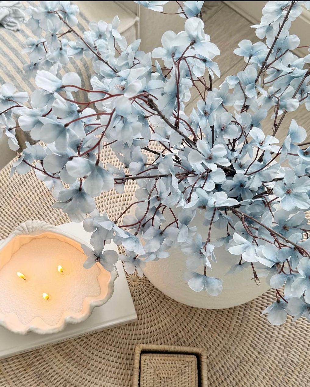 Artificial ocean blue blossom stem from Starlight Express, featuring vibrant blue flowers and green foliage, ideal for decorative arrangements.