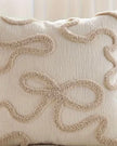 Cream and beige bow square boucle cushion cover by Starlight Express, featuring soft textured fabric and elegant bow detail.