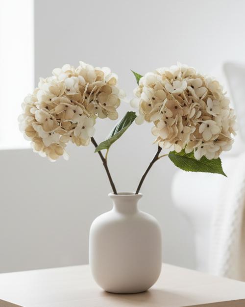 Artificial soft cream hydrangea stem from Starlight Express with short, lush blooms, ideal for home floral arrangements.