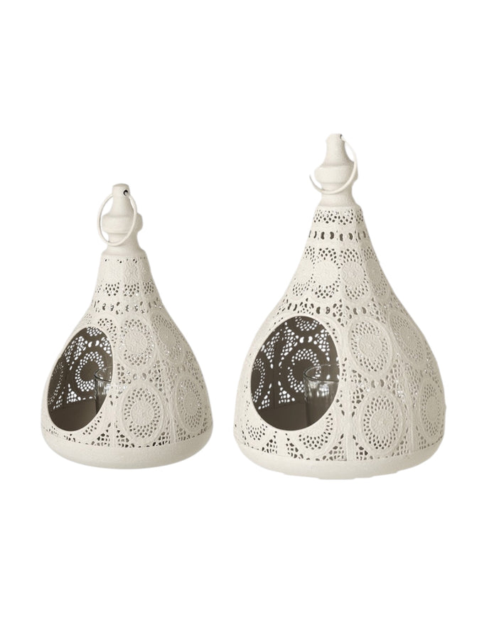 White Moroccan style tealight lantern for decorative lighting, featuring intricate patterns and a classic design by Heaven Sends.
