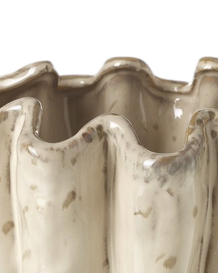 Neutral ceramic wavy vase, home décor by Heaven Sends, showcasing a stylish, textured ceramic vase with a wavy design.