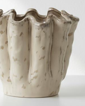 Neutral ceramic wavy vase, a stylish home décor piece by Heaven Sends, featuring a smooth, flowing design ideal for modern interiors.