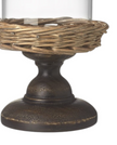 Small glass cloche on a metal and wicker base, decorative home décor piece from Heaven Sends.