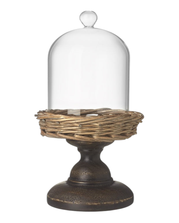 Small glass cloche with metal and wicker base, decorative home décor piece by Heaven Sends.