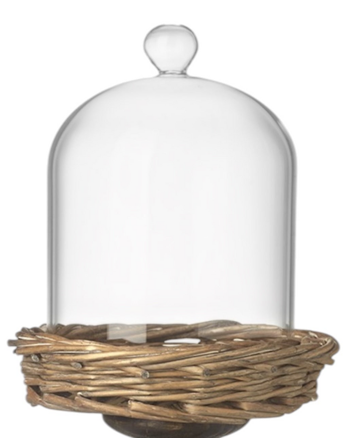 Small glass cloche with metal and wicker base, decorative home décor piece by Heaven Sends.