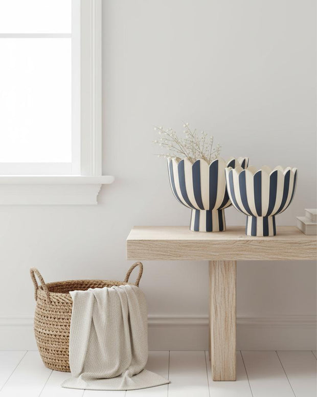 Navy blue and white striped footed bowl for home décor, decorative ceramic bowl with a classic striped design.