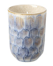 Navy blue tall ceramic candle from Heaven Sends, elegant candle holder with a lit candle inside.