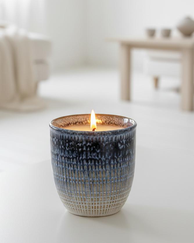 Navy blue ceramic candle from Heaven Sends, styled for home décor, with a smooth finish and elegant design.