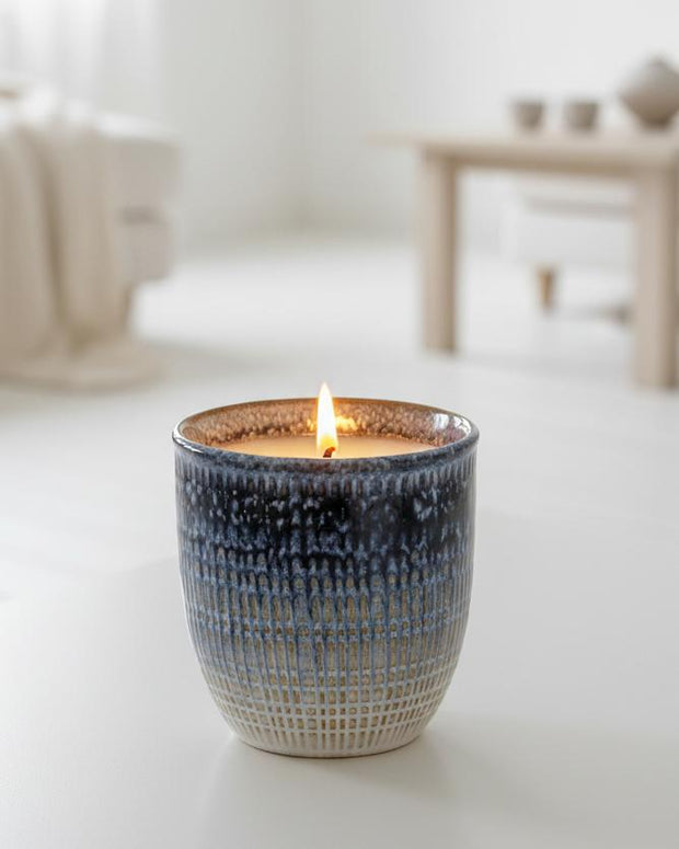 Navy blue ceramic candle from Heaven Sends, styled for home décor, with a smooth finish and elegant design.