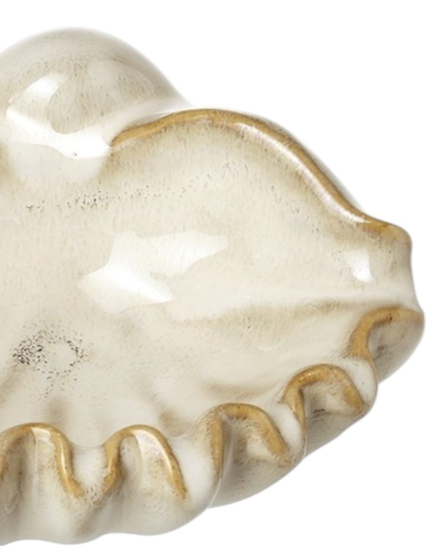 Beige ceramic shell bowl for home décor, featuring a smooth shell shape and glossy finish, by Heaven Sends.