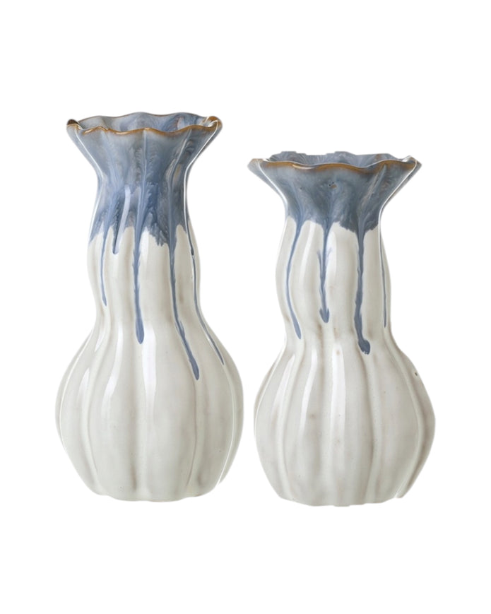 Blue and white ceramic vase with intricate floral patterns, handcrafted by Heaven Sends, showcasing a classic decorative design.