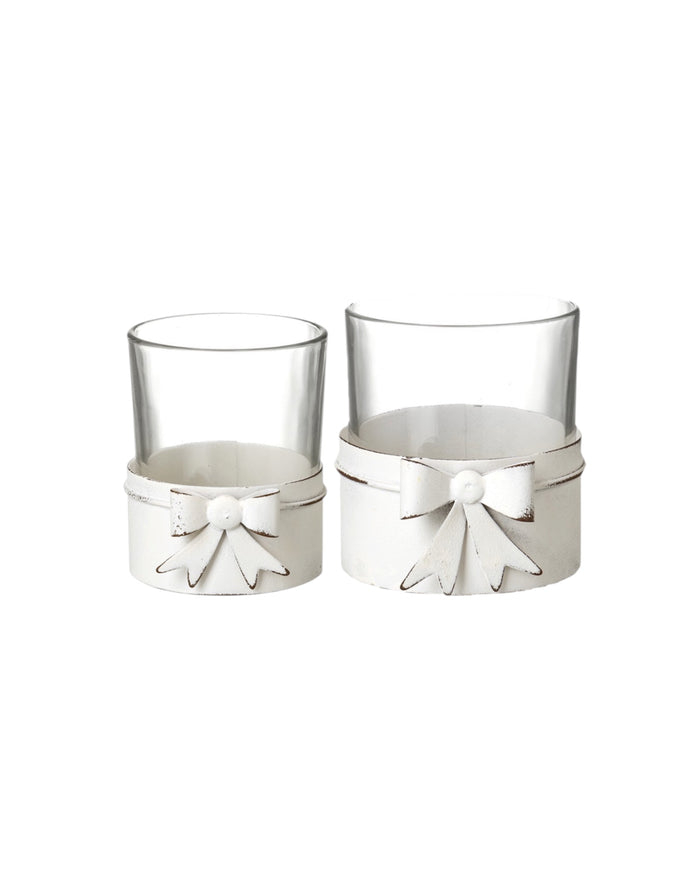 White metal bow hurricane candle holder for tealights, decorative home décor piece by Heaven Sends.