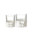 White metal bow hurricane candle holder for tealights, decorative home décor piece by Heaven Sends.