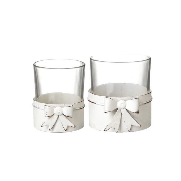 White metal bow hurricane candle holder for tealights, decorative home décor piece by Heaven Sends.