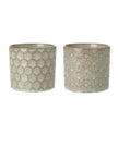 Beige patterned ceramic planter pot for home décor with intricate design, showcasing a stylish addition to indoor plants.