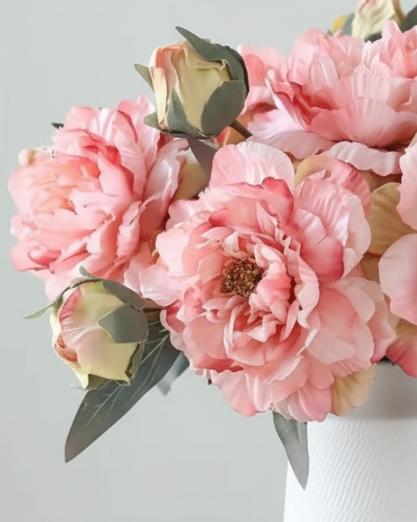 Artificial pink rose and double peony flower stem by Starlight Express, showing realistic pink blooms on a green stem.