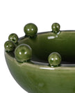 Small olive green bowl with bobble edge, stylish Coach House home decor piece, perfect for tabletop or display.