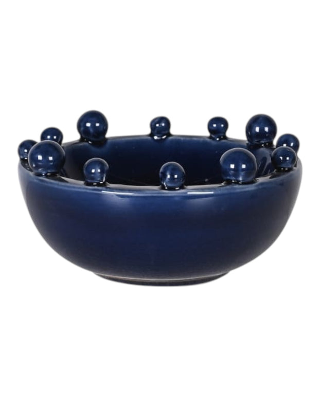 Small navy blue bowl with bobble-edged design, ideal for home decor, by Coach House.