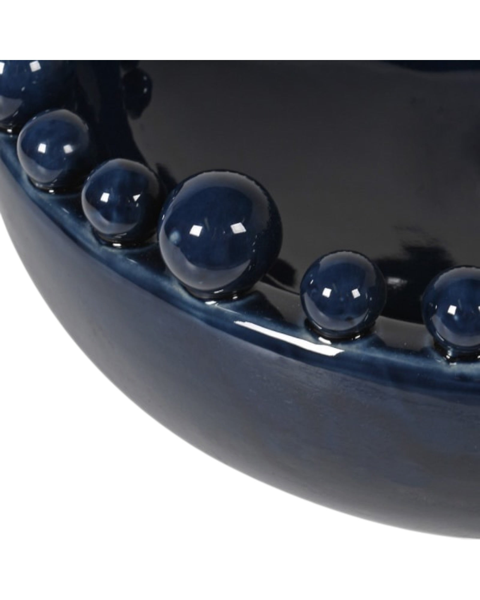 Large navy blue ceramic bowl with a bobble-edged design, ideal for home decor by Coach House.