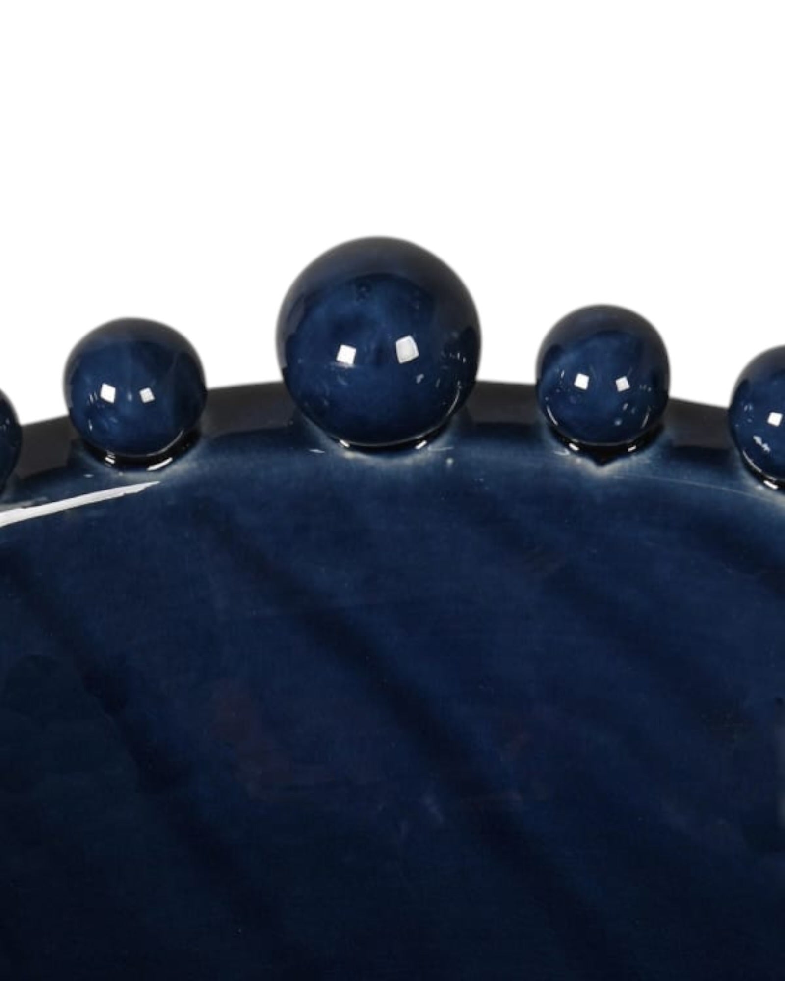 Large navy blue ceramic bowl with bobble-edged design, ideal for home decor by Coach House.