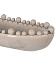 Large beige Coach House oval bowl with bobble-edged design, ideal for home decor and decorative table settings.