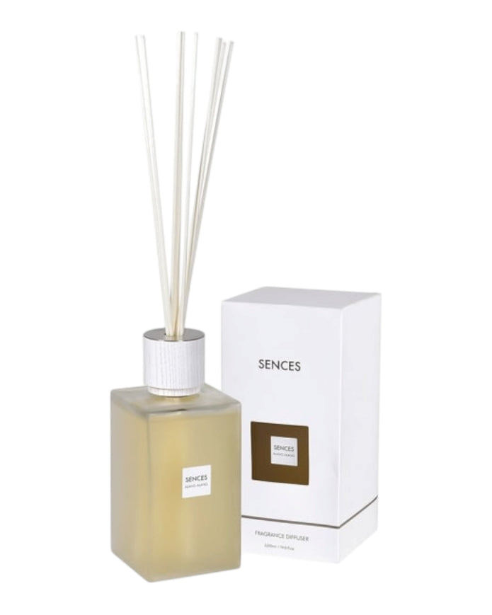Large white Alang Alang reed diffuser by Coach House, a stylish home fragrance with elegant design and natural reed sticks.