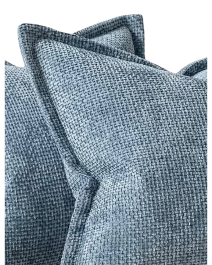 Denim blue woven design cushion cover with soft furnishings edge by Starlight Express, displayed on a decorative cushion.