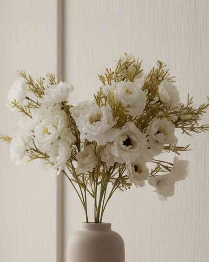 Artificial white and neutral poppy flower stem from Starlight Express, featuring realistic fabric petals and green stem.