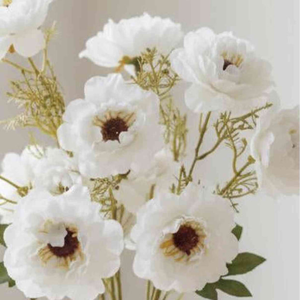 Artificial white and neutral poppy flower stem from Starlight Express, featuring realistic petals and green foliage.