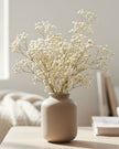 Artificial Cream Neutral Gypsophila stem from Starlight Express, showcasing delicate white flowers on a realistic plastic plant stem.