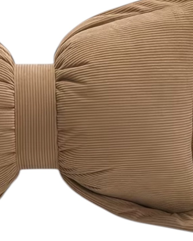 Neutral brown corduroy striped bow cushion from Starlight Express, showcasing soft plush fabric and decorative bow detail.