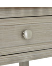 Four-drawer console table from Hill Interiors' Serene Collection, showcasing sleek wooden furniture with a smooth finish.