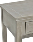 Hill Interiors Serene Collection four-drawer console table, modern furniture piece with sleek design and wooden finish.