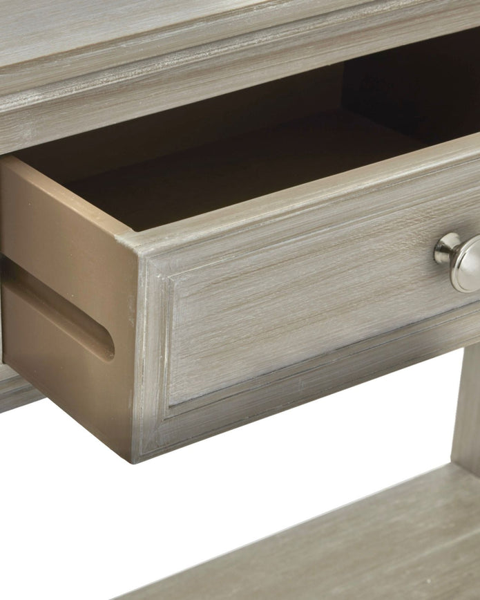 Hill Interiors Serene Collection four-drawer console table with sleek wood finish, perfect for modern entryways and living rooms.