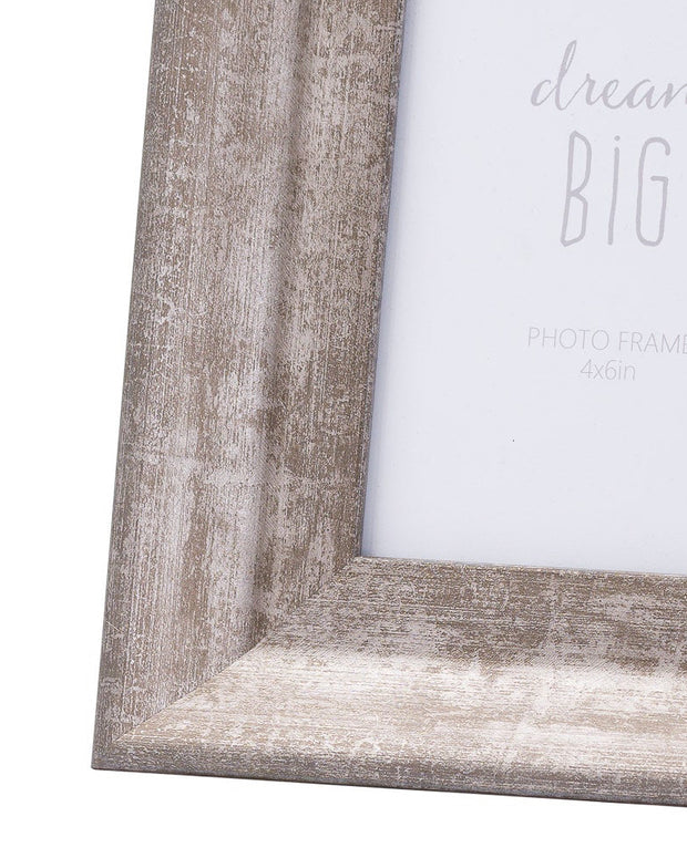 Silver wooden photo frame with a wide border featuring a sleek design, perfect for showcasing pictures in a stylish way.