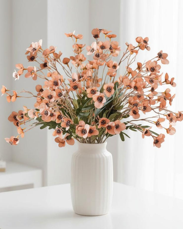 Artificial Daisy Flower Stem in bright orange, from Starlight Express, showcasing realistic synthetic plant with vibrant blossom.