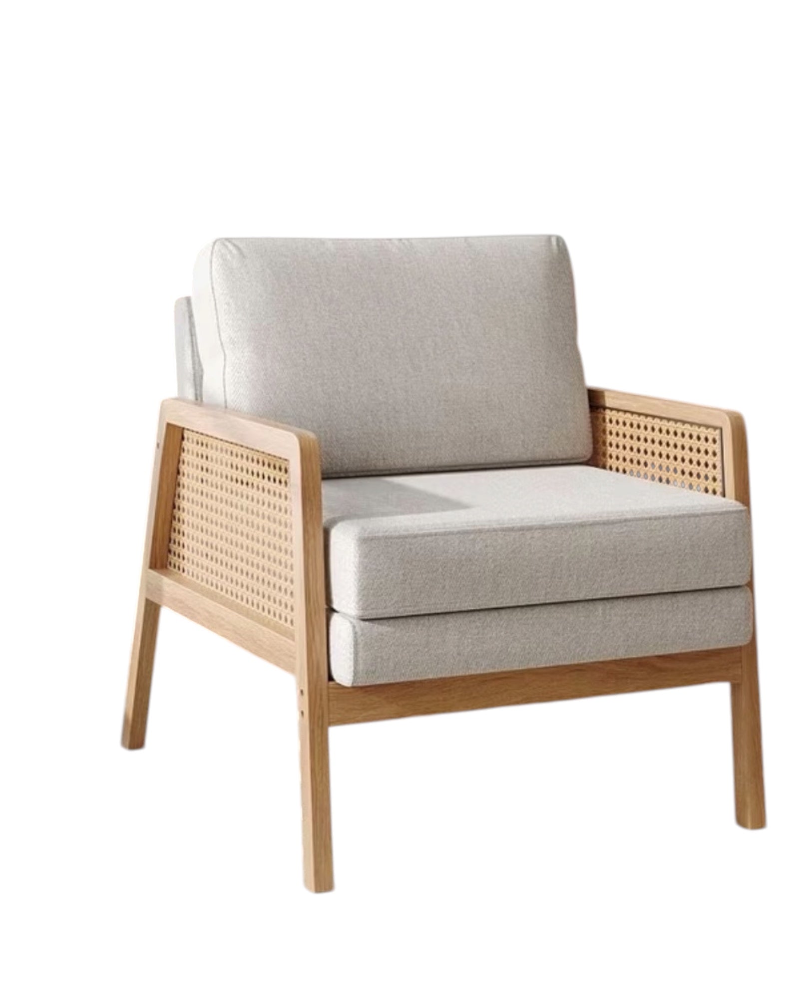 Beige linen upholstered Compton rattan armchair with natural wood frame, styled for cozy living spaces, by Starlight Express.