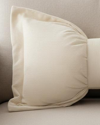 Cream neutral corduroy striped bow cushion from Starlight Express, soft furnishings with a plush, textured fabric and bow detail.