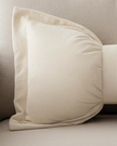 Cream neutral corduroy striped bow cushion from Starlight Express, soft furnishings with a plush, textured fabric and bow detail.