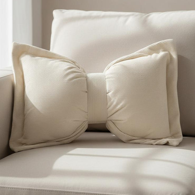 Cream neutral corduroy striped bow cushion from Starlight Express, soft furnishings with a plush fabric and decorative bow detail.
