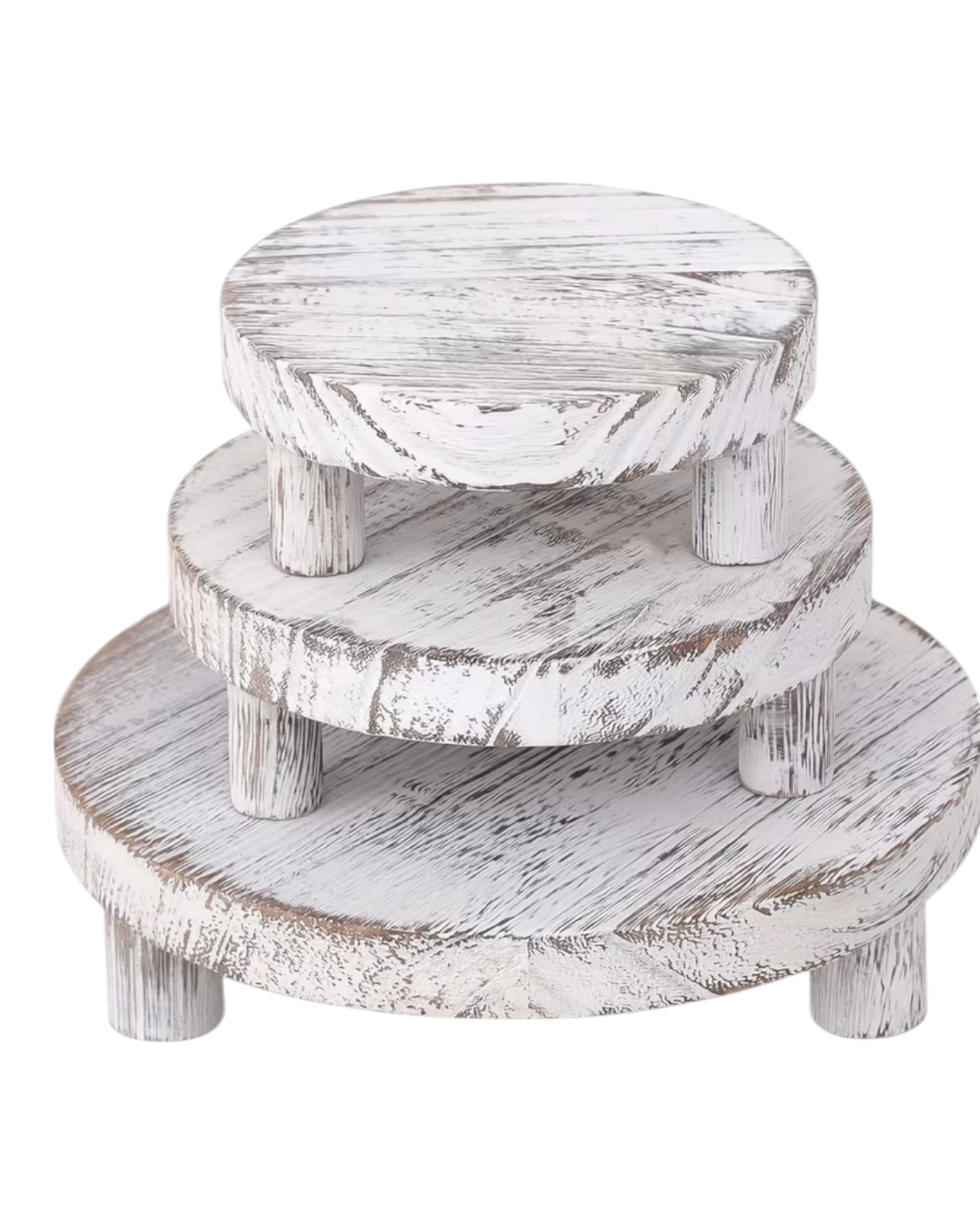 Set of three white washed round risers for home decor displays by Starlight Express, featuring natural wood finish and varying heights.