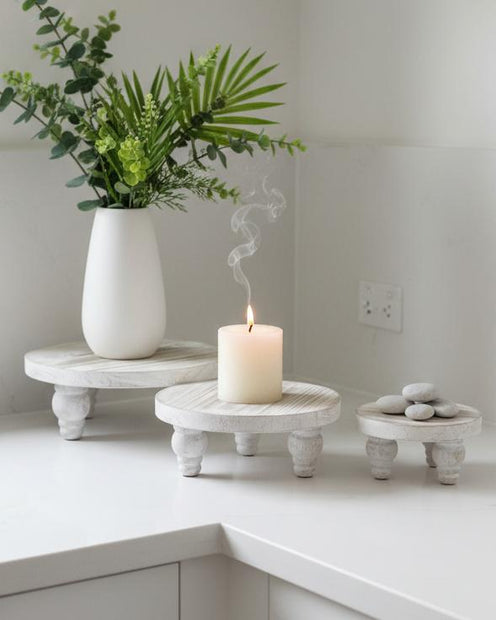 Set of three white washed round risers for home decor, perfect for display and styling arrangements by Starlight Express