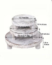 Set of three white washed round risers for home decor, featuring natural wood finish and versatile display options.